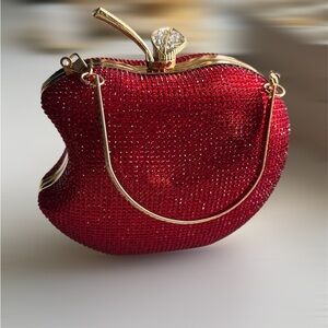 Apple Shaped Bag with Sparkles
Exclusive red apple-shaped bag,